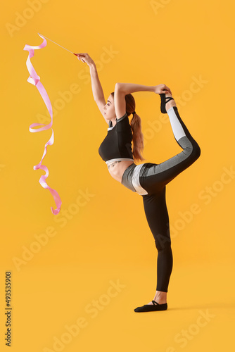 Beautiful young woman doing...