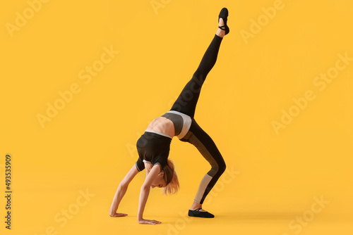 Beautiful young woman doing...