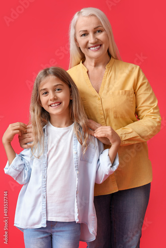 Little girl with her grandm...