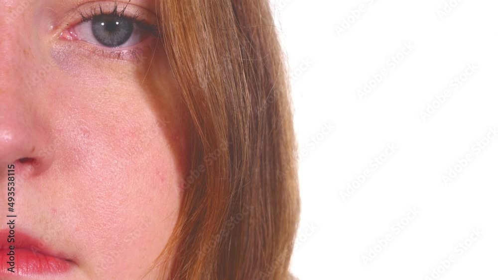 Half of female face: Cropped view of attractive woman with clean skin Half of female face: Cropped view of attractive woman with clean skin