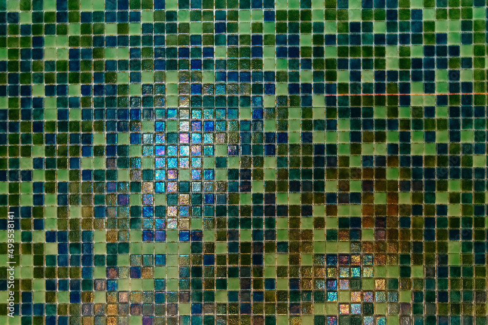 Fototapeta premium Green modern Mosaic tiles on wall. Sauna room interior design with mosaic.