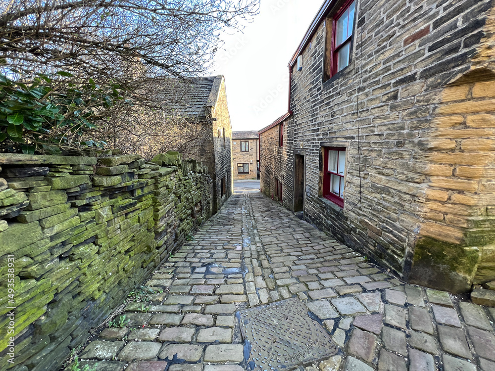View down, Back Field, with Victorian stone cobbles, and cottages, in the Bronte birthplace of, Thornton, Bradford, UK