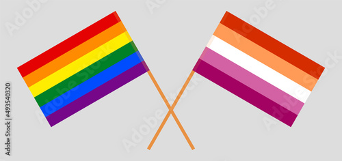 Crossed flags of LGBTQ and Lesbian Pride. Official colors. Correct proportion