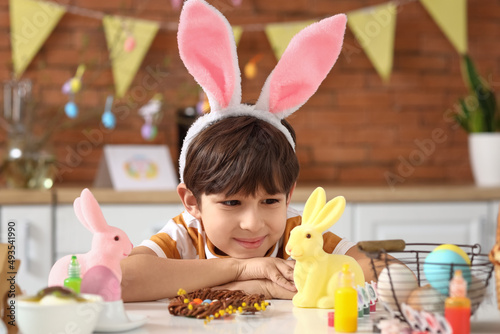 Cute little boy with bunny ...
