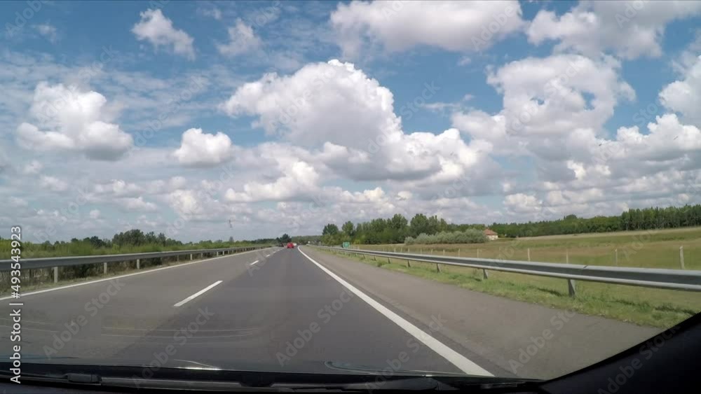 driving a highway in the sunshine driving a highway in the sunshine