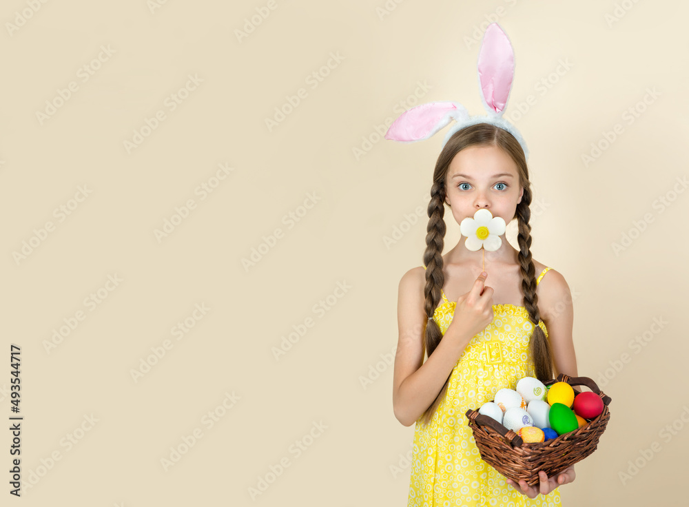 Smiling little girl with basket full of colorful easter eggs Smiling little girl with basket full of colorful easter eggs
