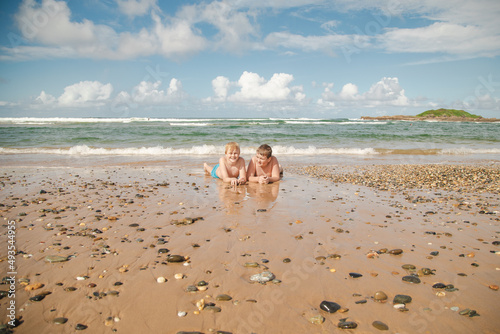 Kids playing on the beach at Coffs Harbour, NSW Australia