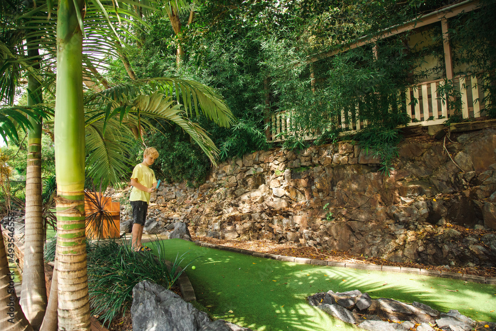 Kids playing mini golf at the Big Banana fun park, Coffs Harbour