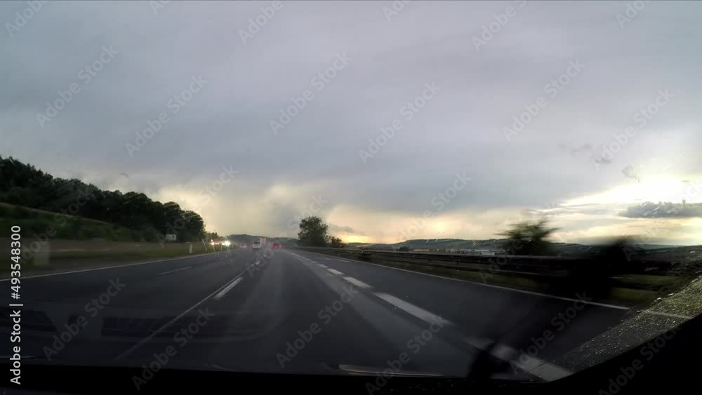 driving a highway in the rain