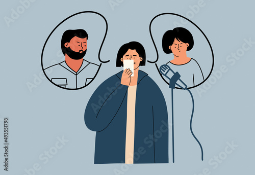 Fear of public speaking concept. A woman sweats and worries while reading from a sheet into a microphone.