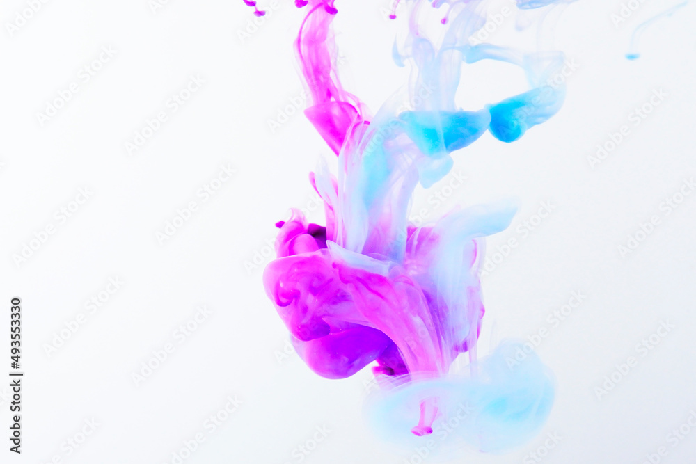 Fototapeta premium 水中に広がるカラフルな絵具