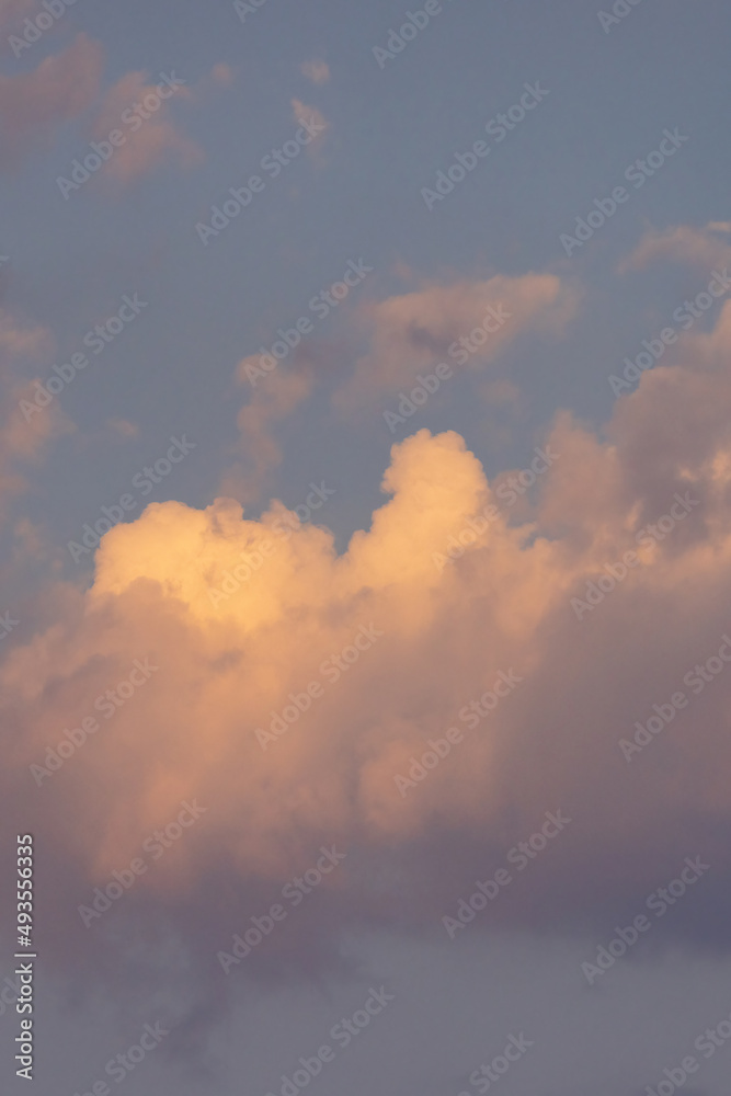 orange and pink dark clouds at sunset