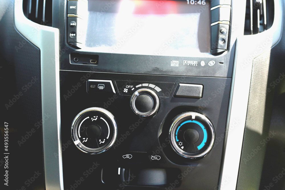 Fototapeta premium Inside the car - gear lever and control panel