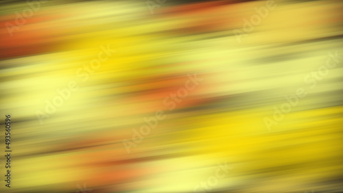 Twisted vibrant gradient blurred of yellow orange and red colors with smooth movement of the gradient in the frame with copy space. Abstract sideways narrow lines concept