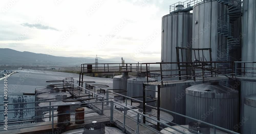 Beer factory, Juice and limonade factory. Manufacturing. Huge Barrels. Aerial drone shot
