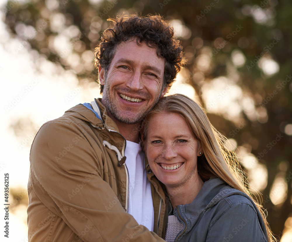 Love that will never grow old. A cropped portrait of a happy affectionate couple standing together outdoors.