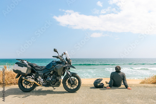 Fotobehang 海とバイク