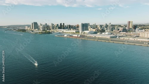 Cinematic San Diego on sunny summer day with fishing boats in blue water bay photo