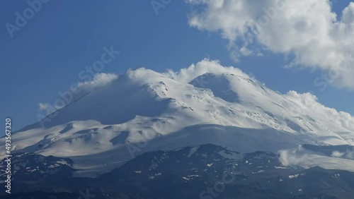 Wallpaper Mural Beautiful view of Mount Elbrus and clouds, North Caucasus mountains, Russia, zoom out timelapse 4k Torontodigital.ca