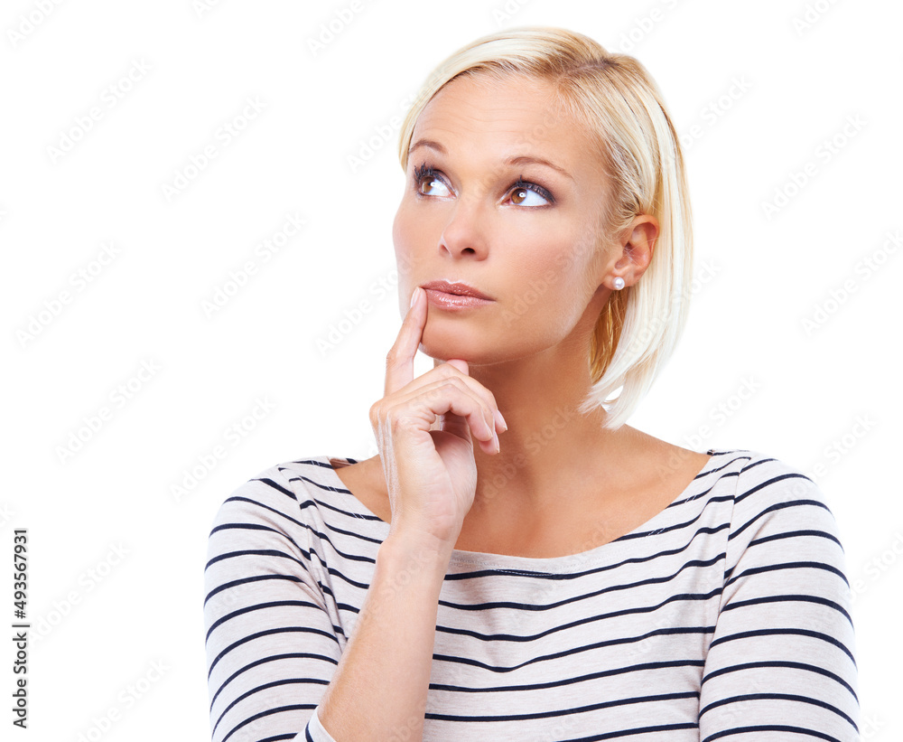 After some careful consideration.... Studio shot of a beautiful young blonde woman looking thoughtful. After some careful consideration.... Studio shot of a beautiful young blonde woman looking thoughtful.
