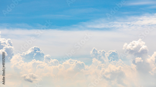 Panorama or panoramic photo of blue sky and white clouds or cloudscape.