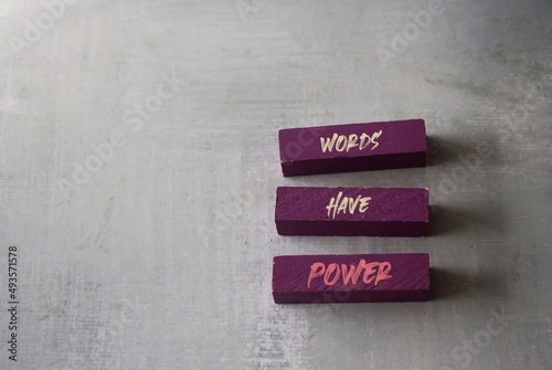 Text WORDS HAVE POWER on wooden blocks. Education, storytelling and copywriting marketing business photo