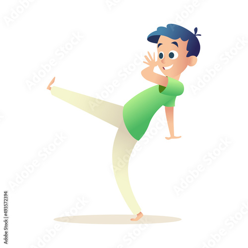 Kid practices Brazilian capoeira, standing in pose, swinging his leg. Joyful boy have fun doing sports, dancing