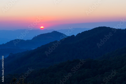 Sunset evening with silhouette mountain