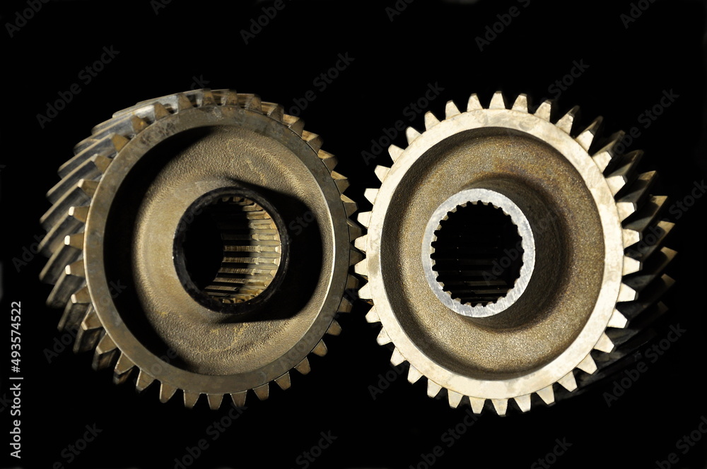 Cogwheels on a black background. Cogwheels on a black background.