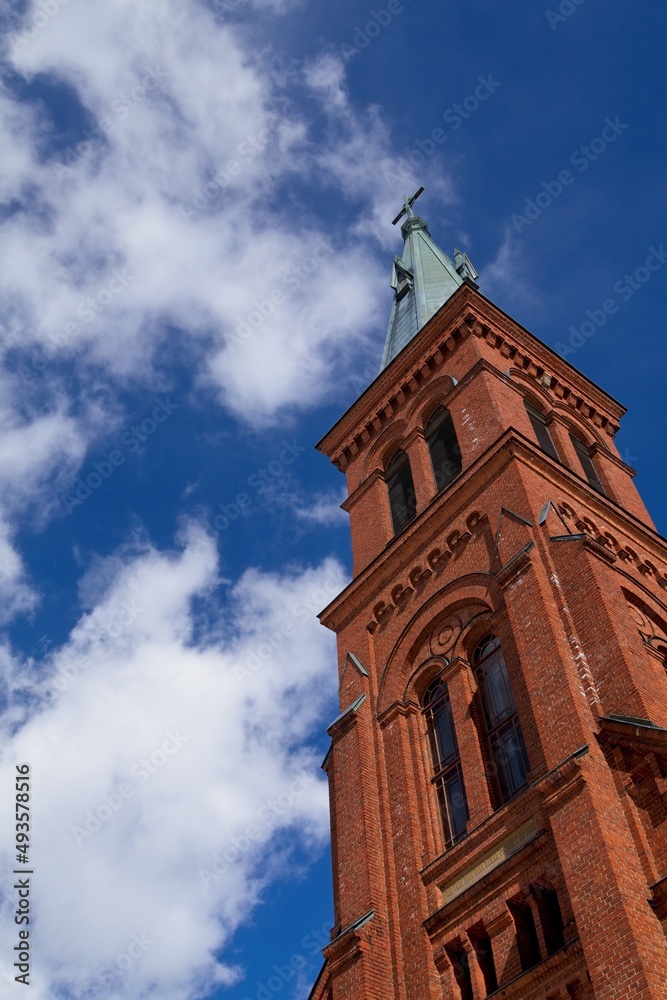 View of tower at Sipoo Church. The church is neo-Gothic in architecture and was consecrated in 1885. It's located at Sipoo municipality of Finland.