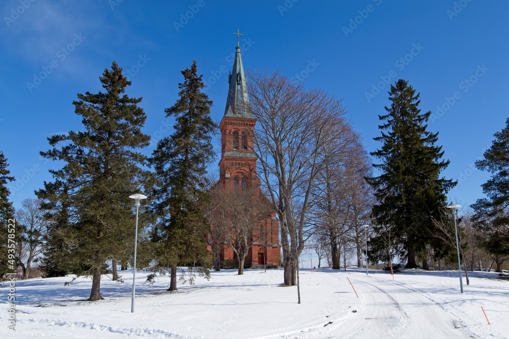 Winter view of beautiful Sipoo Church. The church is neo-Gothic in architecture and was consecrated in 1885. It's located at Sipoo municipality of Finland.