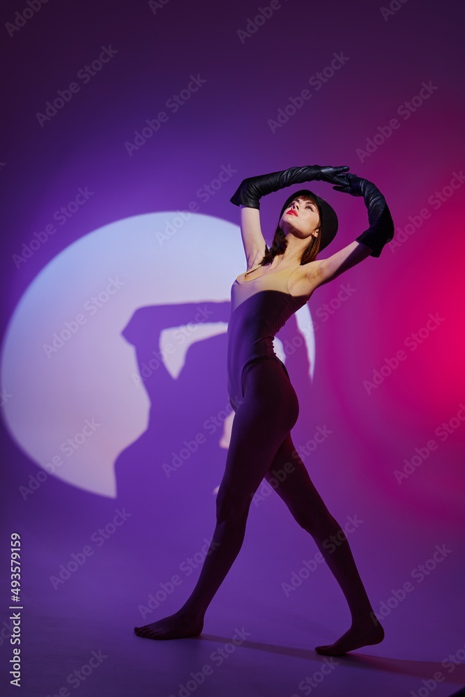 Portrait of a charming lady scene spotlight posing neon color background unaltered