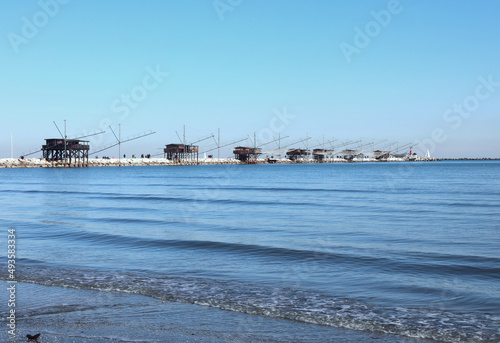 Array of fishing sheds on the sea in Northern Italy near Sottomarina Town in Venice Province © ChiccoDodiFC