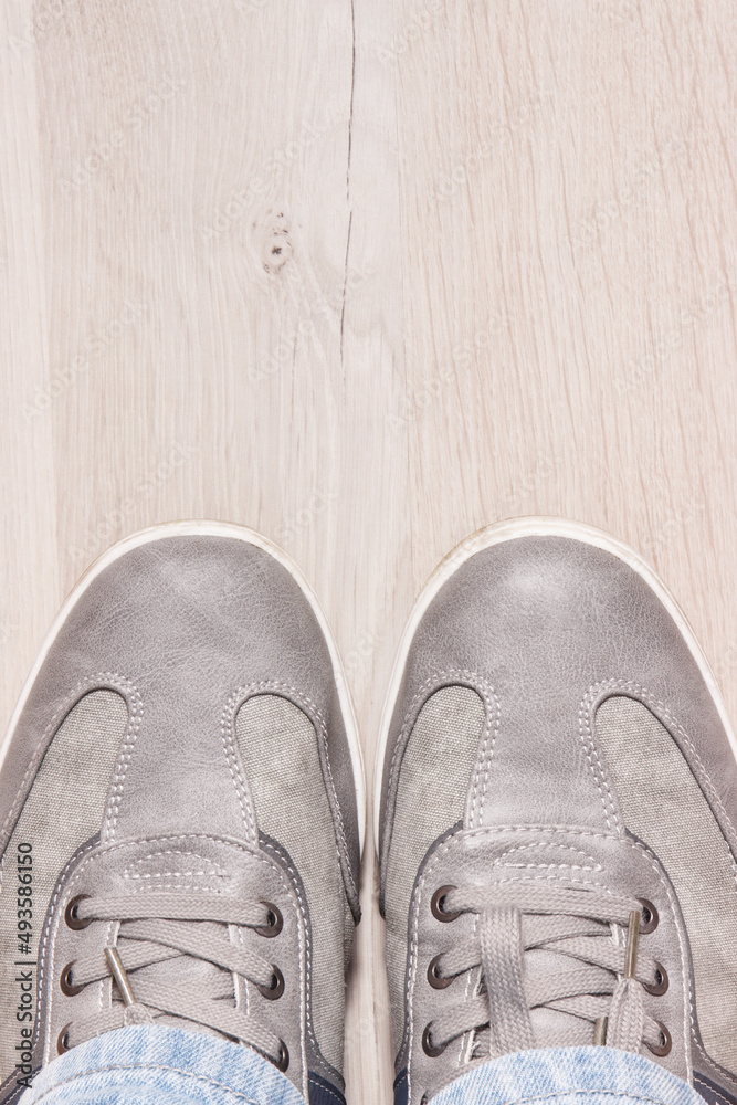 Comfortable gray leather shoes on board, male footwear, place for text Comfortable gray leather shoes on board, male footwear, place for text