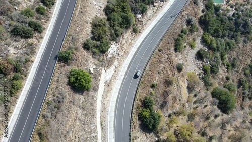 Car is driving along a serpentine. Beautiful view of Turkey.
