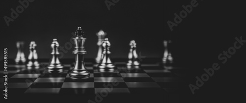 Konstfotografi Close-up king chess standing first on chess board concepts challenge or battle fighting of business team and leadership strategy and organization risk management or team player