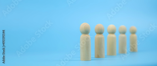 Wooden doll stand for human goal or people business team creative thinking and resources for personnel leader and teamwork or leadership team player.