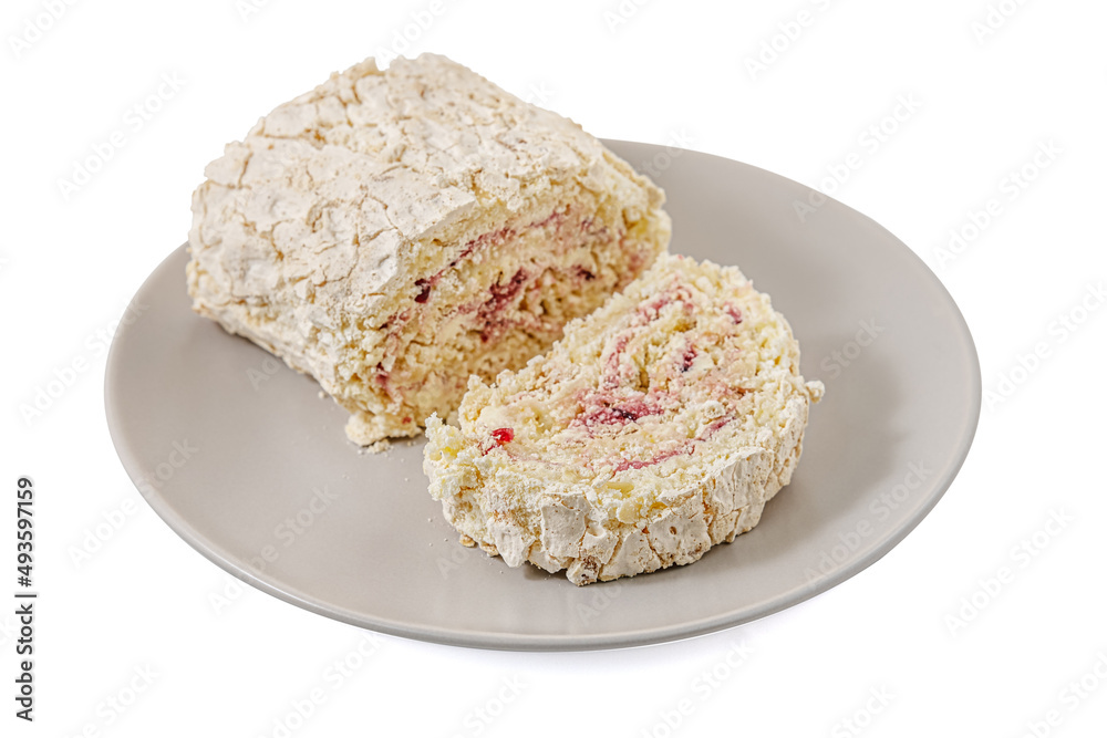 delicious meringue roll with strawberry cream on a plate isolated on white delicious meringue roll with strawberry cream on a plate isolated on white
