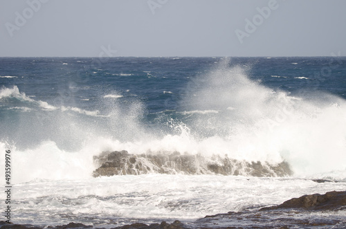 Wave breaking against the shore. El Confital. La Isleta Protected Landscape. Las Palmas de Gran Canaria. Gran Canaria. Canary Islands. Spain.