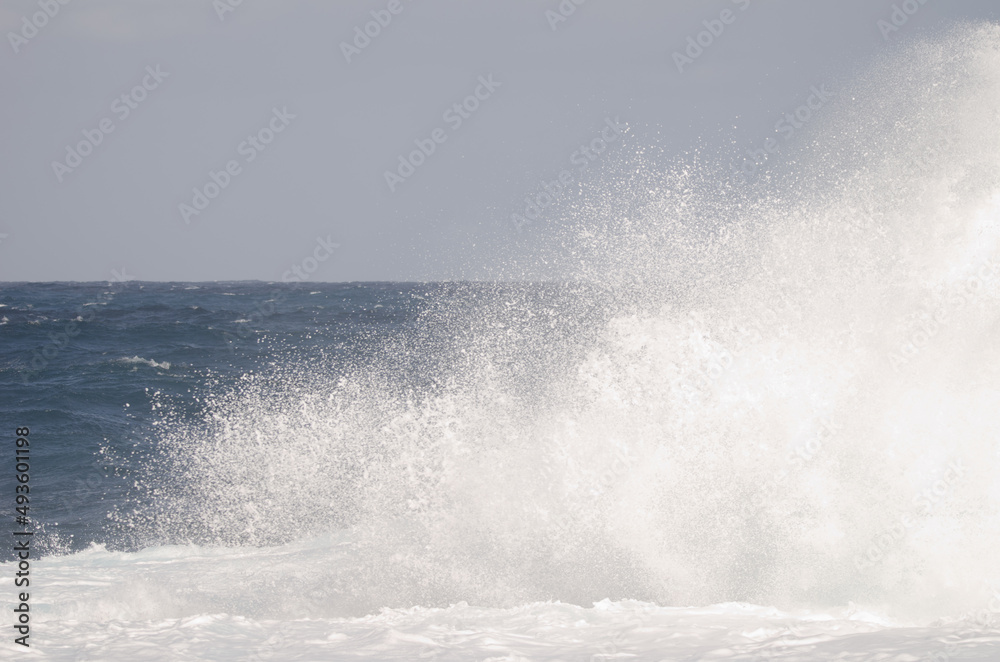 Wave breaking against the shore. El Confital. La Isleta Protected Landscape. Las Palmas de Gran Canaria. Gran Canaria. Canary Islands. Spain.