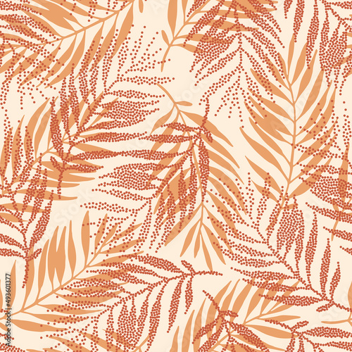 Tropical seamless pattern with dotted palm leaves silhouettes in retro colors