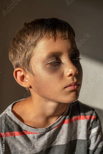 happy boy model after make-up creates a new image for himself, authenticity, horizontal.