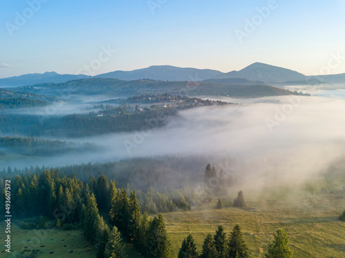 Morning fog in the Ukrainian Carpathians. Aerial drone view.