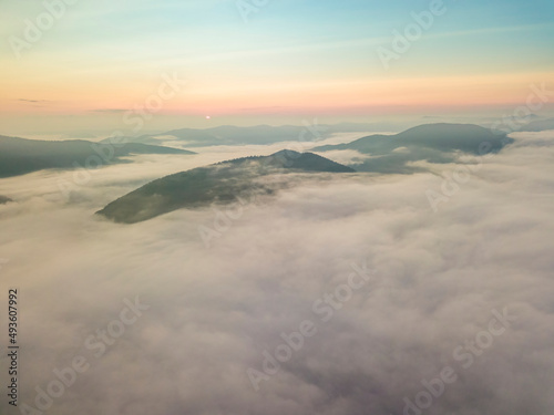 Morning fog in the Ukrainian Carpathians. Aerial drone view.