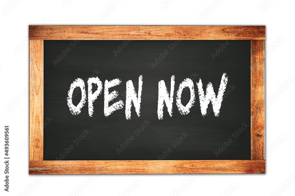 OPEN NOW text written on wooden frame school blackboard. OPEN NOW text written on wooden frame school blackboard.