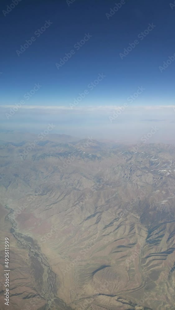 great mountain view from the airplane in the sunny day great mountain view from the airplane in the sunny day