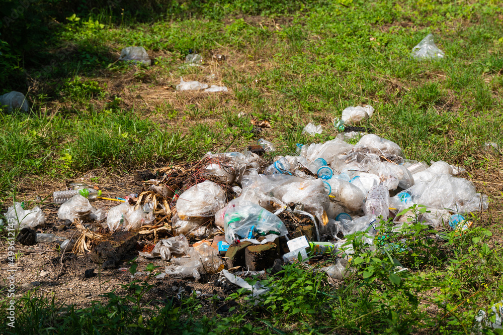 Obraz premium waste trash pile of plastic bottle garbage and more junk. Environment concept, Earth day concept.