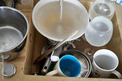 Obraz na płótnie dirty dishes in the sink waiting to be washed w salonie