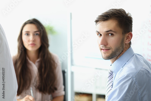 Man business employee on workplace, clerk look in camera on conference meeting