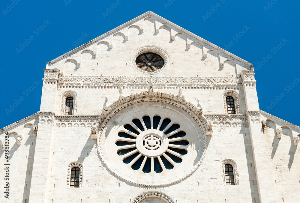 Cathedral facade with large round gothic window in Bari, Italy